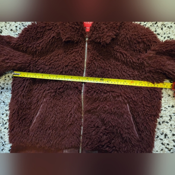 GUESS Faux Fur bomber jacket. Zip up. Fully lined. Size Small. Eggplant/ Purple. - Picture 8 of 10
